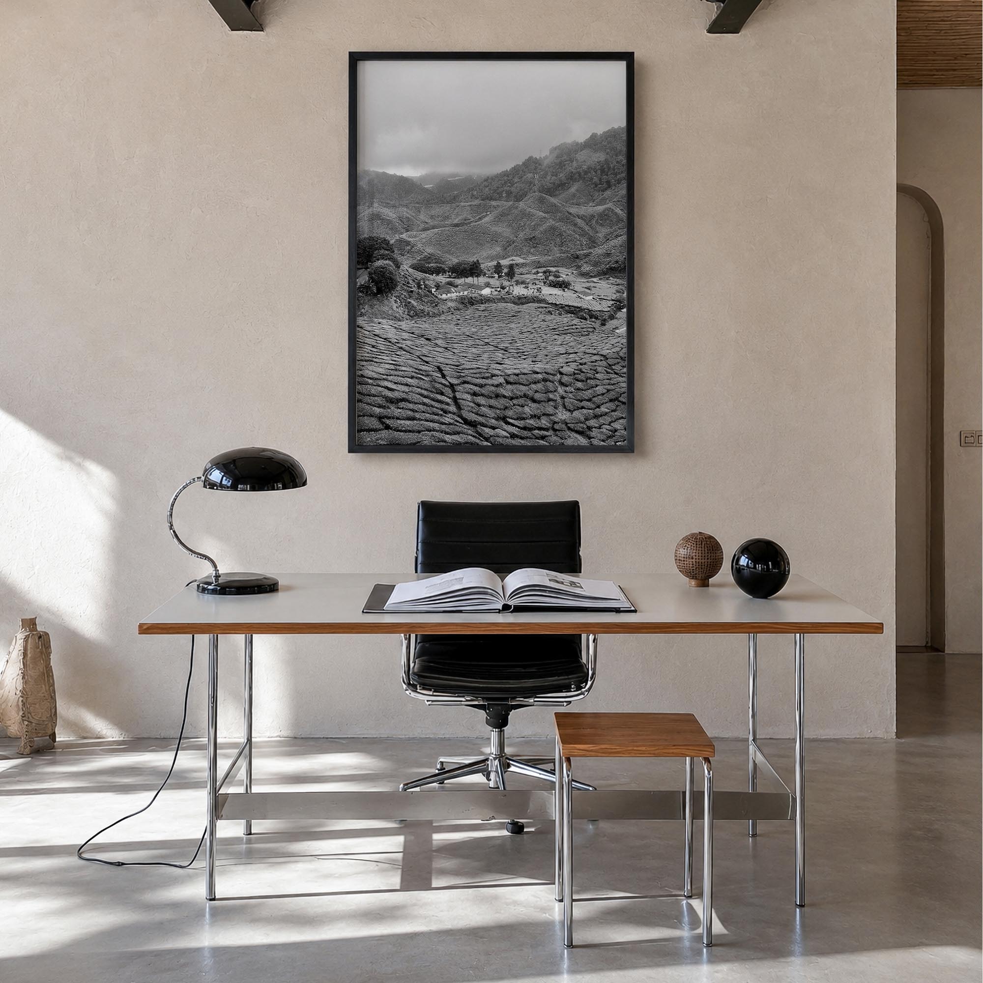 Cameroon black & white photo poster of Africa – vertical wall art in black wood frame, hanging on wall