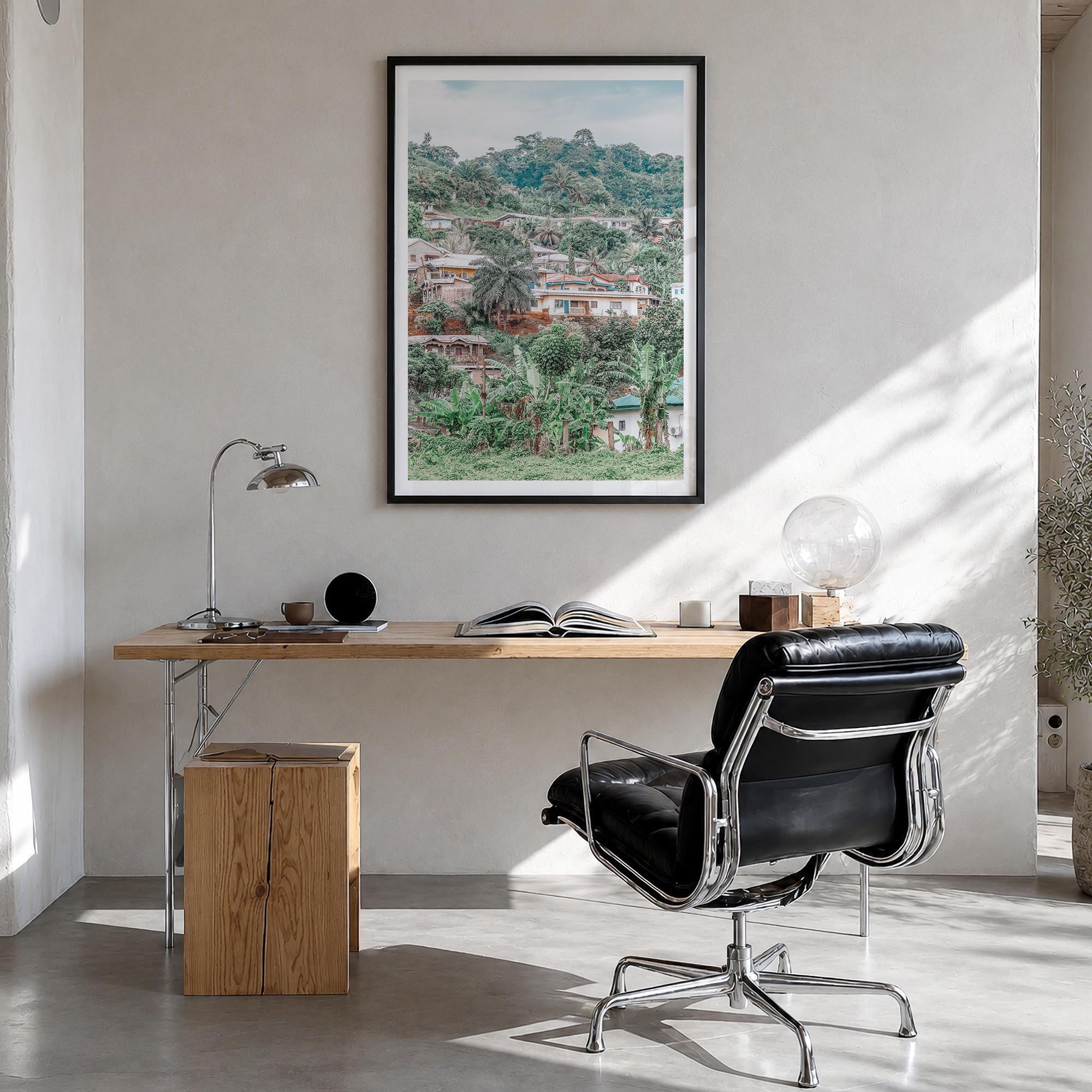 Cameroon colorful photo poster of Africa – vertical wall art in black wood frame with white border, hanging on wall