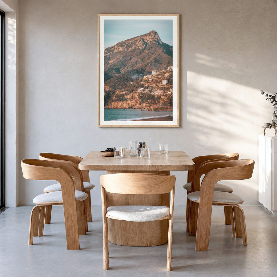 Campania Photo Poster in a natural wood frame, hanging in a dining room, white border