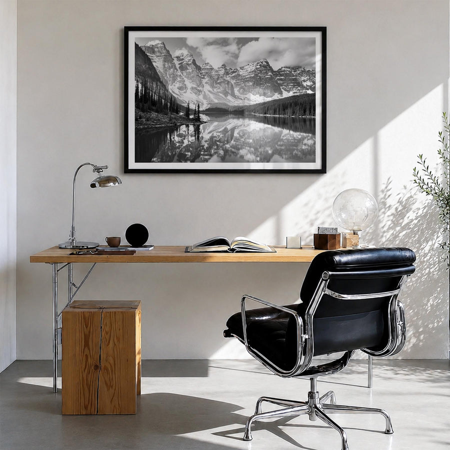 Canada black & white photo poster of North America – horizontal wall art in black wood frame with white border, hanging on wa