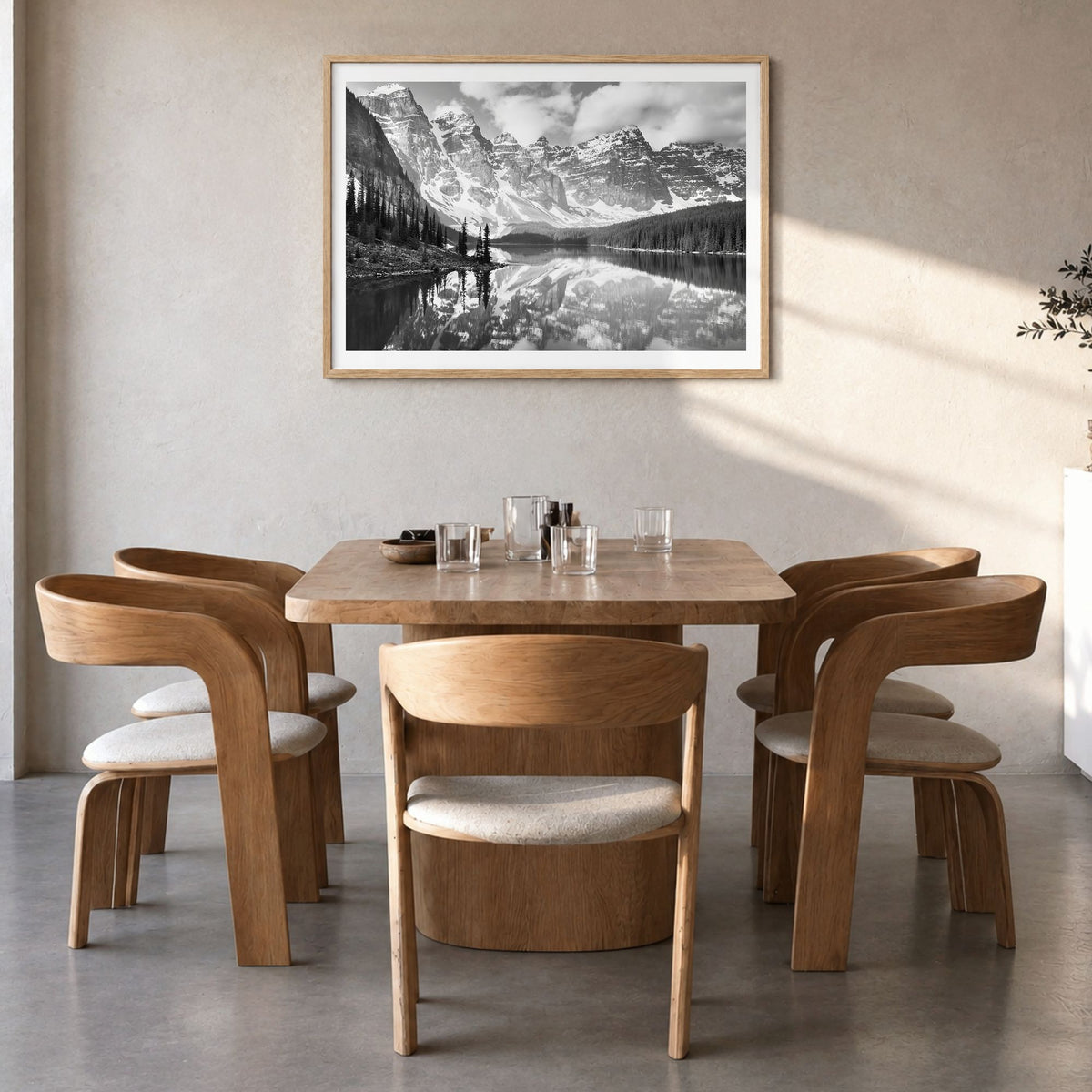 Canada Photo Poster in a natural wood frame, hanging in a dining room, white border