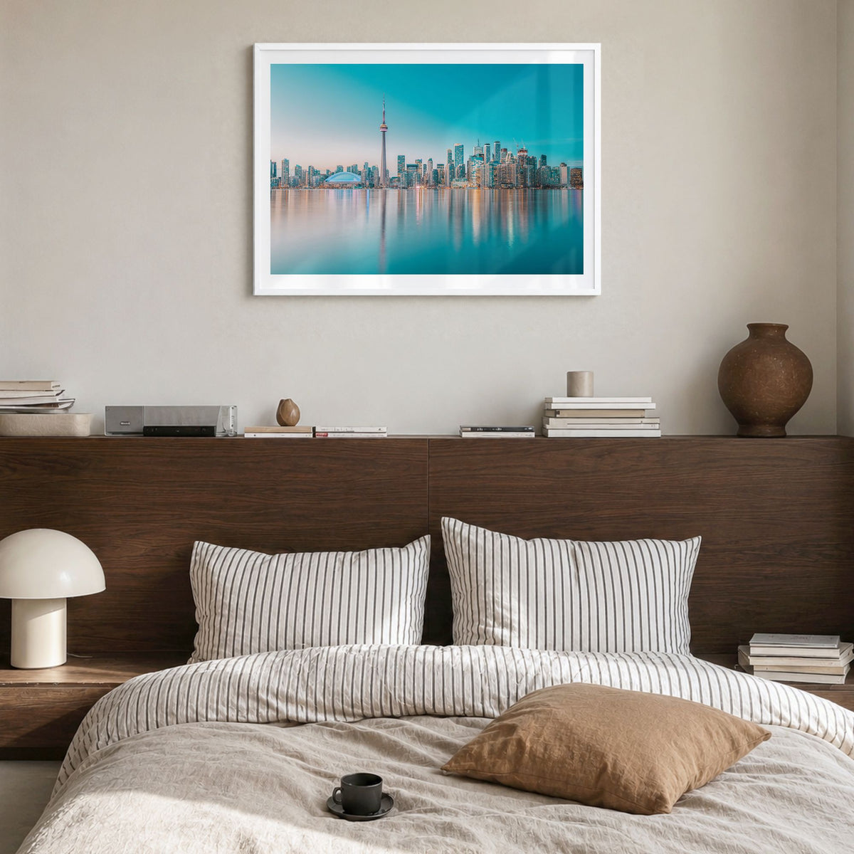Canada Photo Poster in a white wood frame, hanging in a bedroom, white border
