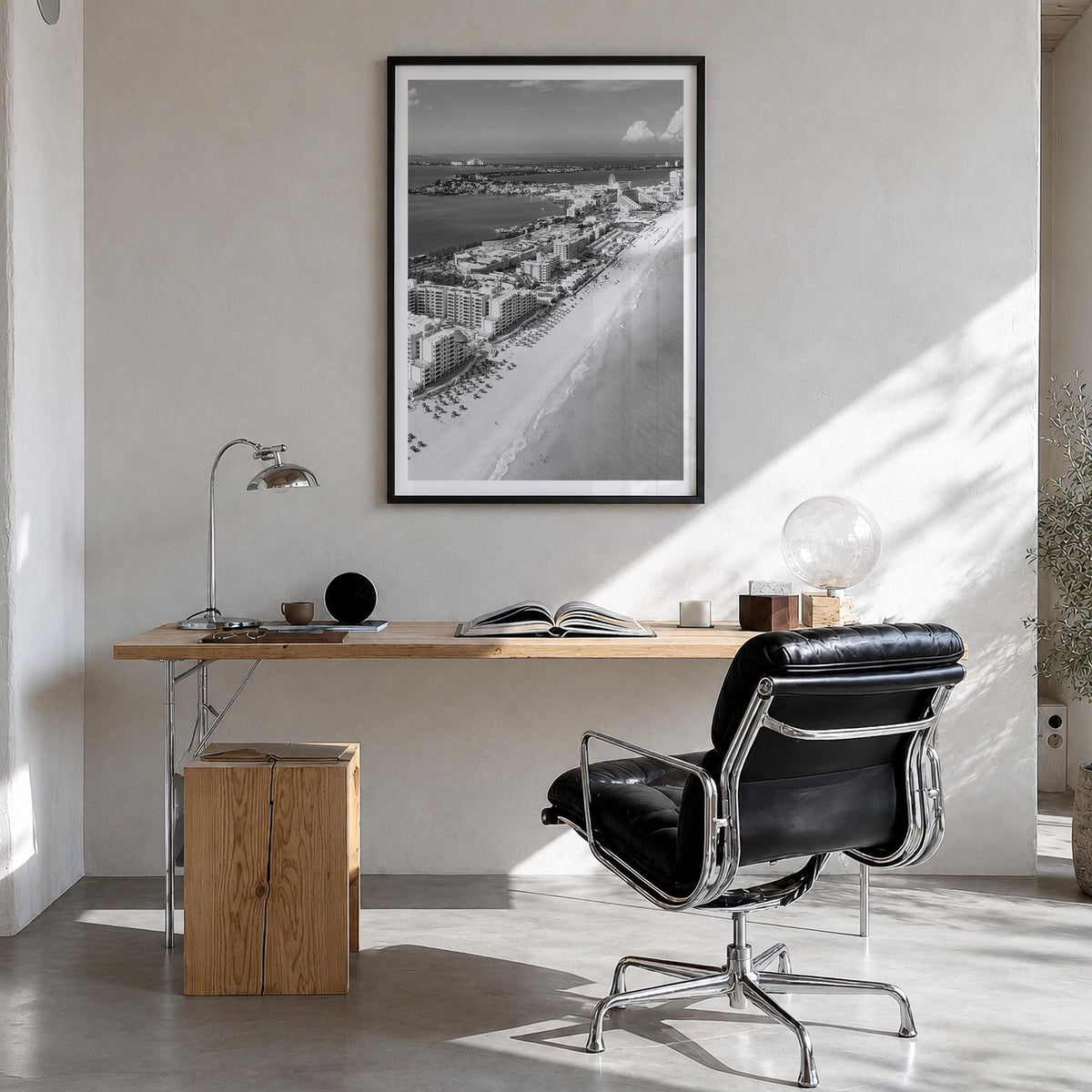 Cancún black & white photo poster of Mexico – vertical wall art in black wood frame with white border, hanging on wall