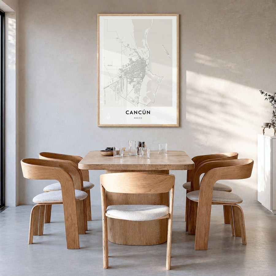 Cancún Map Poster in a natural wood frame, hanging in a dining room