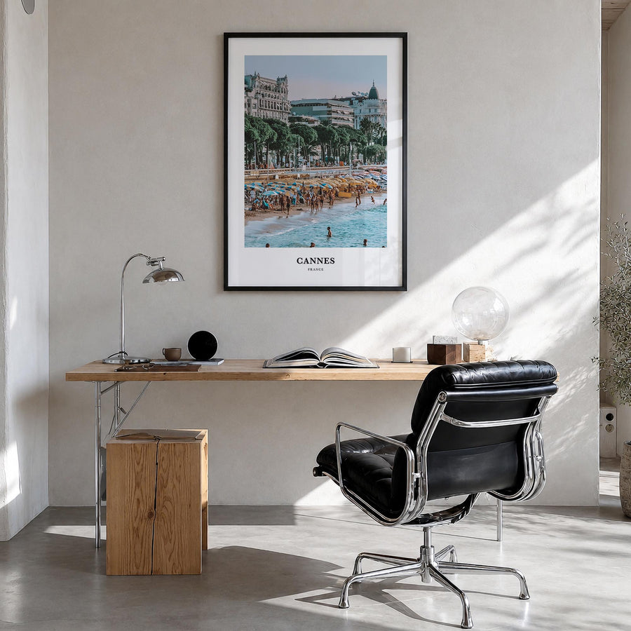 Cannes colorful classic poster of France – vertical wall art in black wood frame, hanging on wall