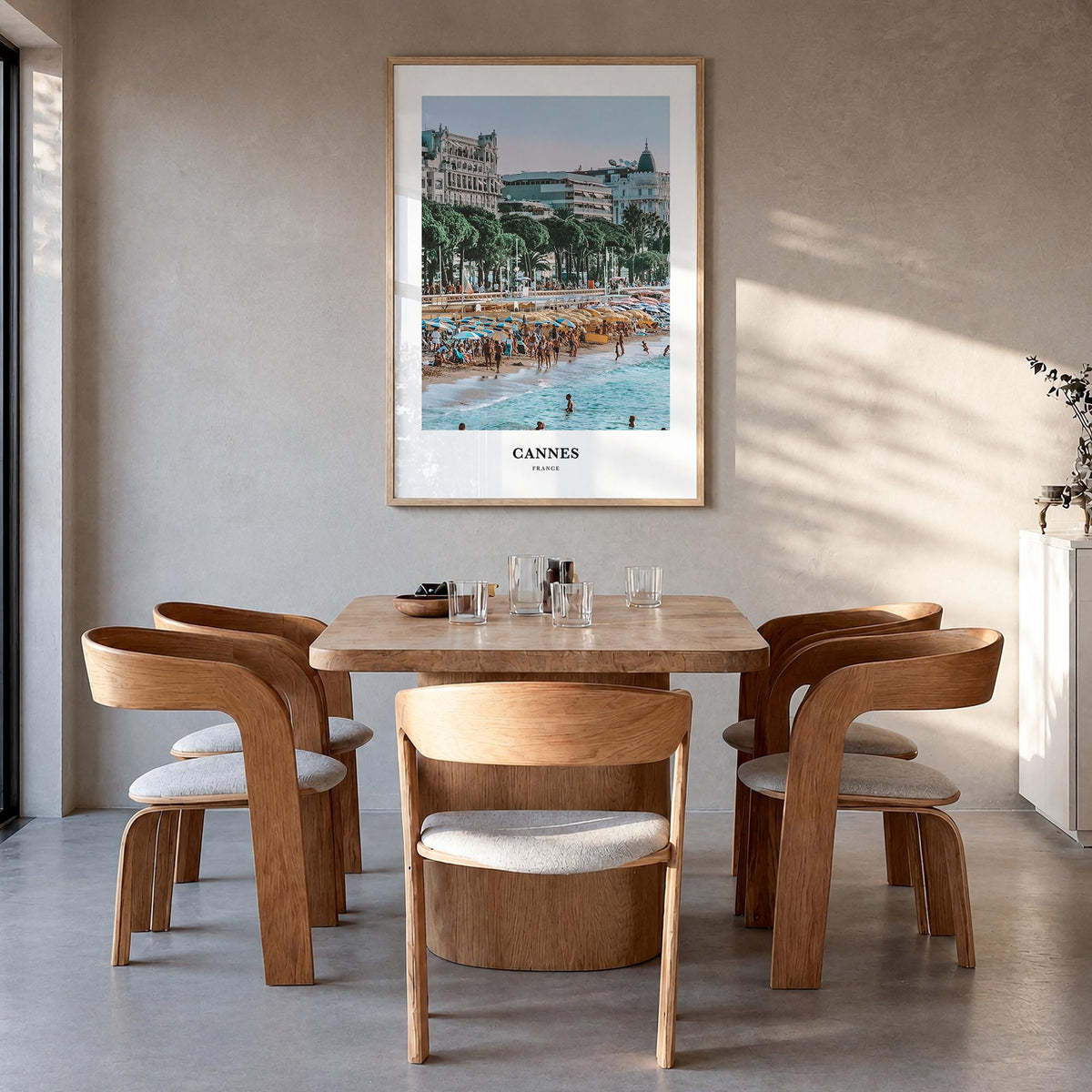 Cannes colorful classic poster of France – vertical wall art in natural wood frame, hanging on wall