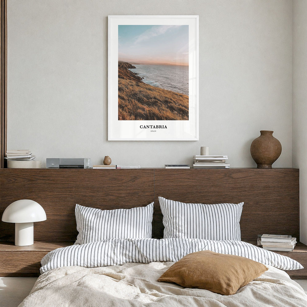 Cantabria Classic Poster in a white wood frame, hanging in a bedroom