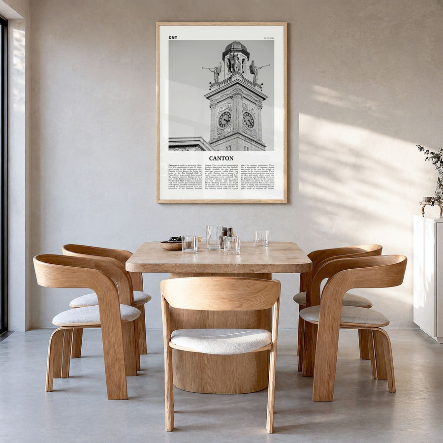 Canton Newspaper Poster in a natural wood frame, hanging in a dining room