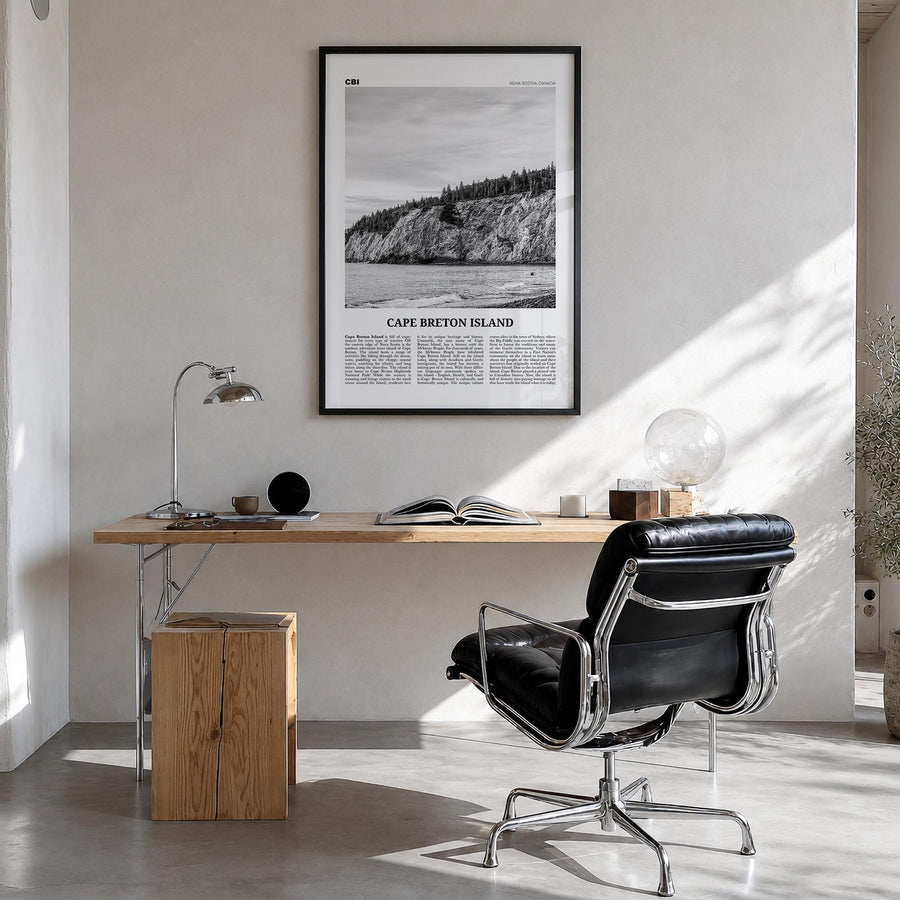 Cape Breton Island black & white newspaper poster of Nova Scotia, Canada – vertical wall art in black wood frame, hanging on 