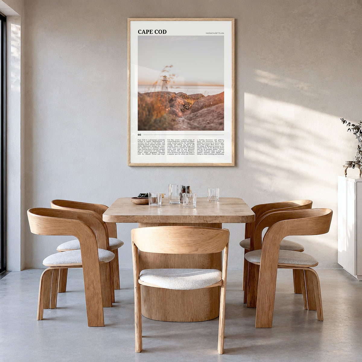Cape Cod Travel No 1 Poster in a natural wood frame, hanging in a dining room
