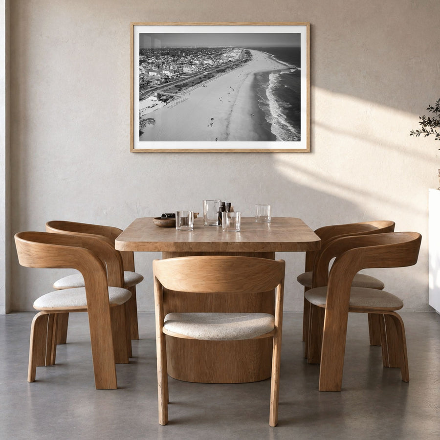Cape May Photo Poster in a natural wood frame, hanging in a dining room, white border