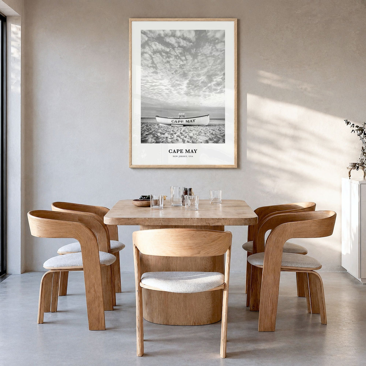 Cape May Classic Poster in a natural wood frame, hanging in a dining room
