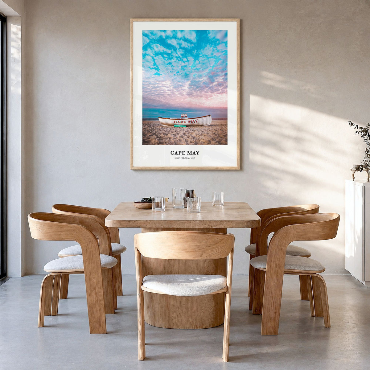 Cape May Classic Poster in a natural wood frame, hanging in a dining room