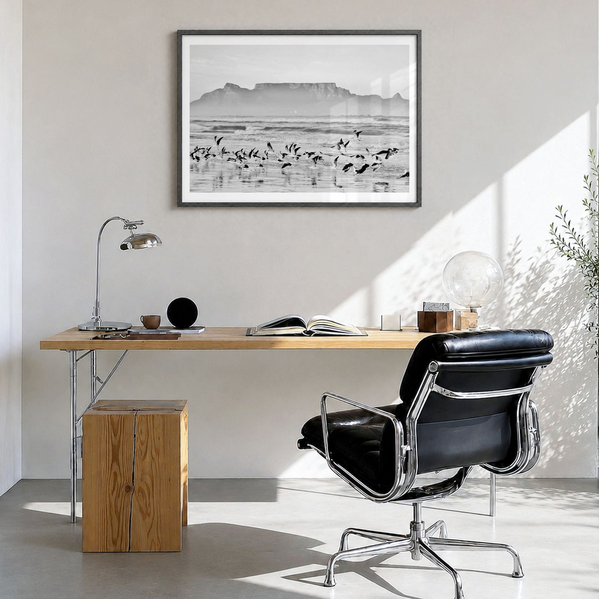 Cape Town Photo Poster in a black wood frame, hanging in a bright home office, white border