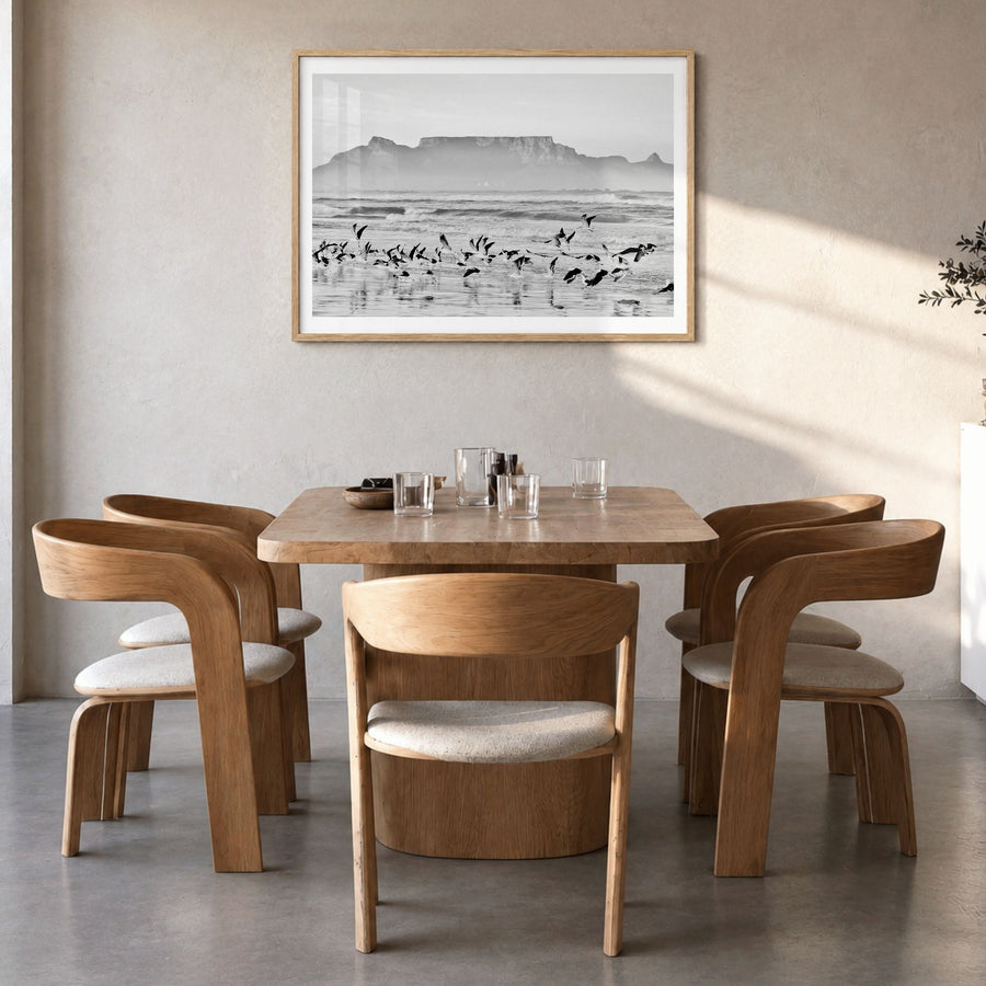 Cape Town Photo Poster in a natural wood frame, hanging in a dining room, white border
