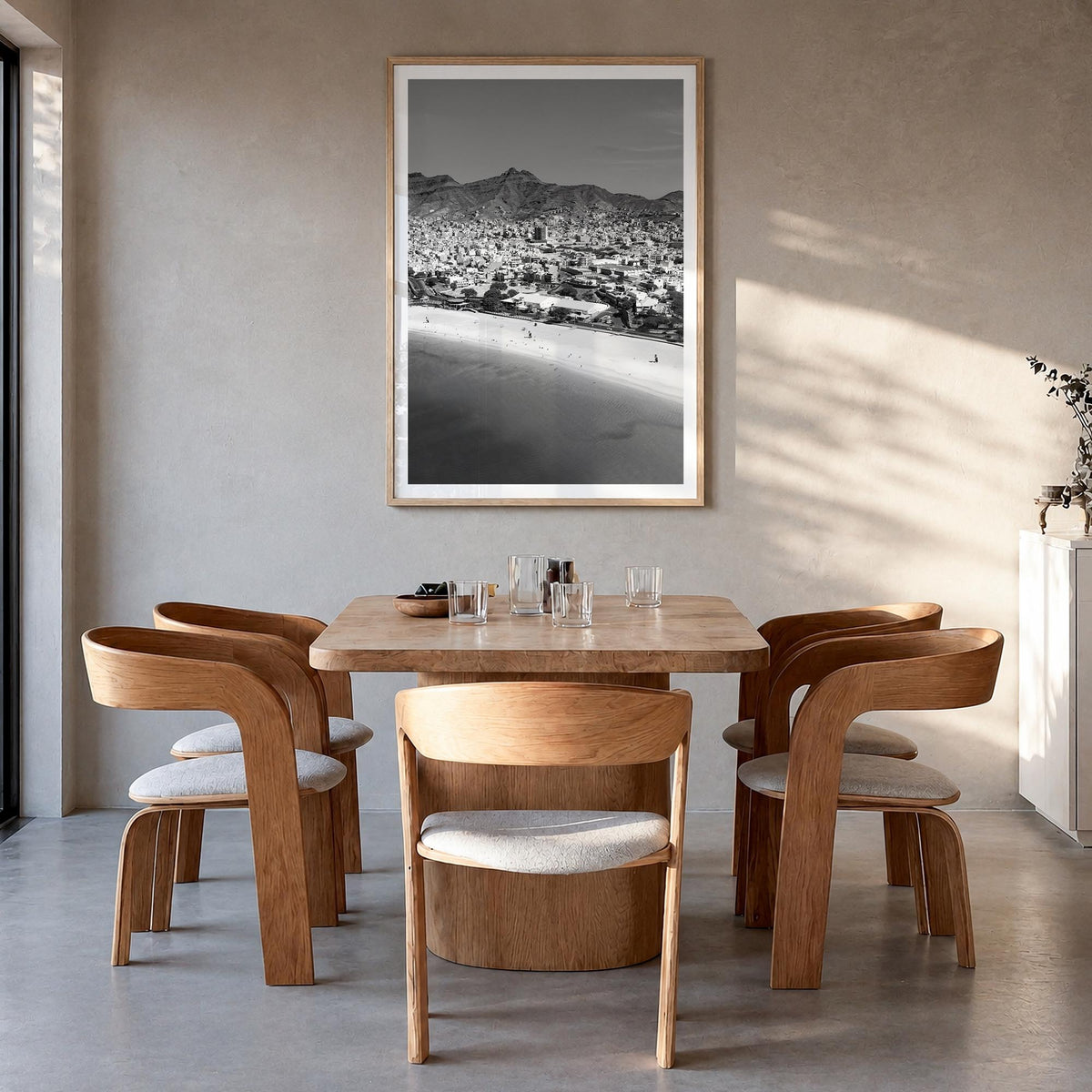 Cape Verde black & white photo poster of Cabo Verde – vertical wall art in natural wood frame with white border, hanging on w