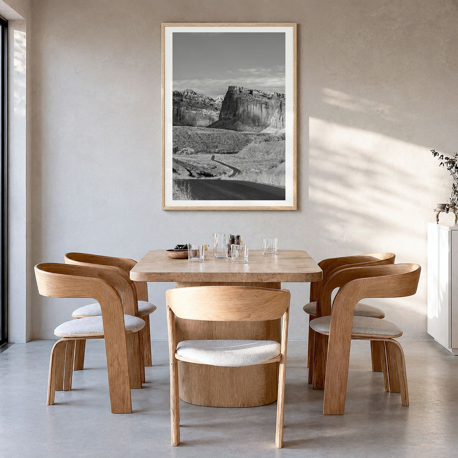 Capitol Reef National Park Photo Poster in a natural wood frame, hanging in a dining room, white border