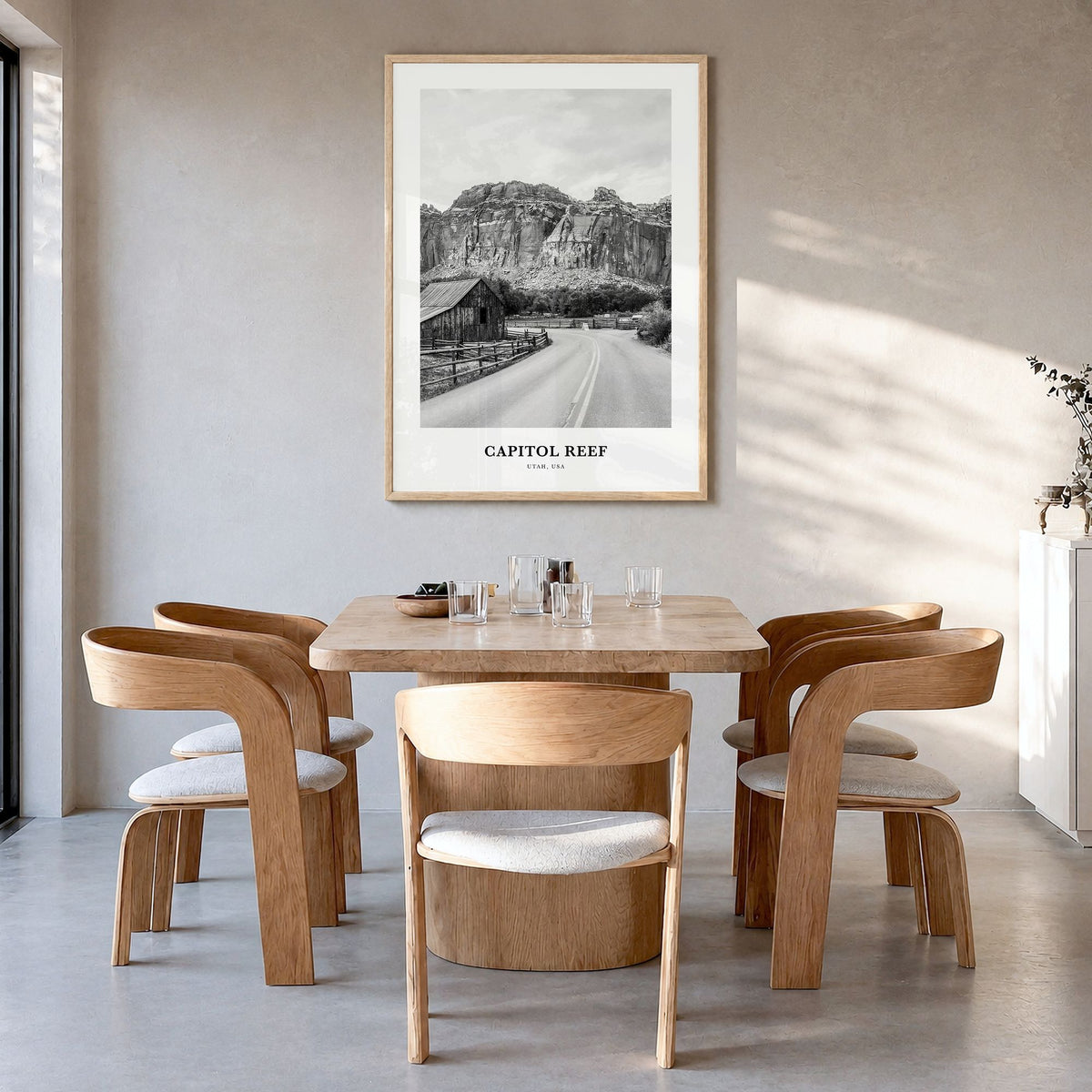 Capitol Reef National Park Classic Poster in a natural wood frame, hanging in a dining room