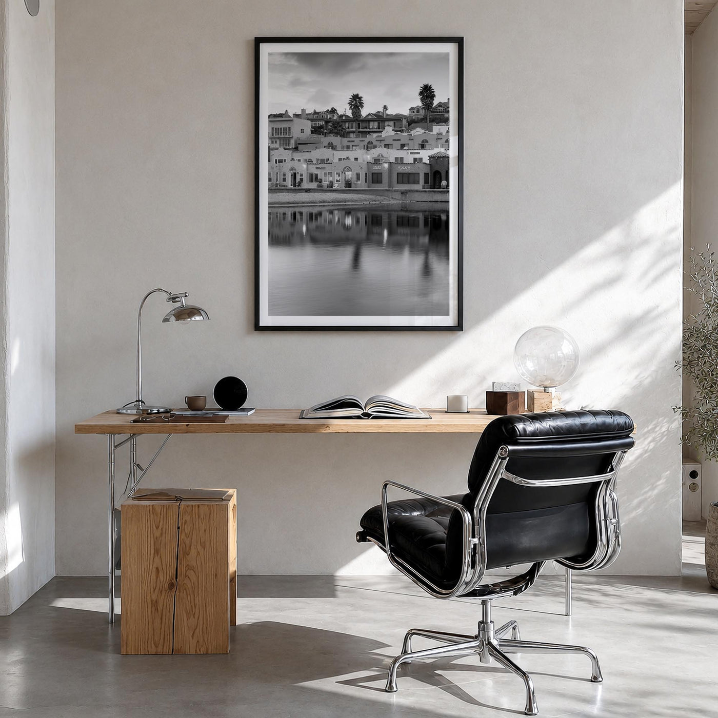 Capitola black & white photo poster of California, USA – vertical wall art in black wood frame with white border, hanging on 