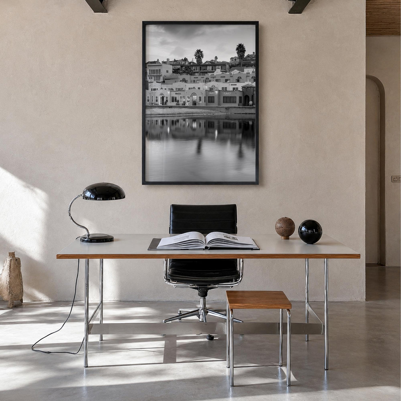 Capitola black & white photo poster of California, USA – vertical wall art in black wood frame, hanging on wall