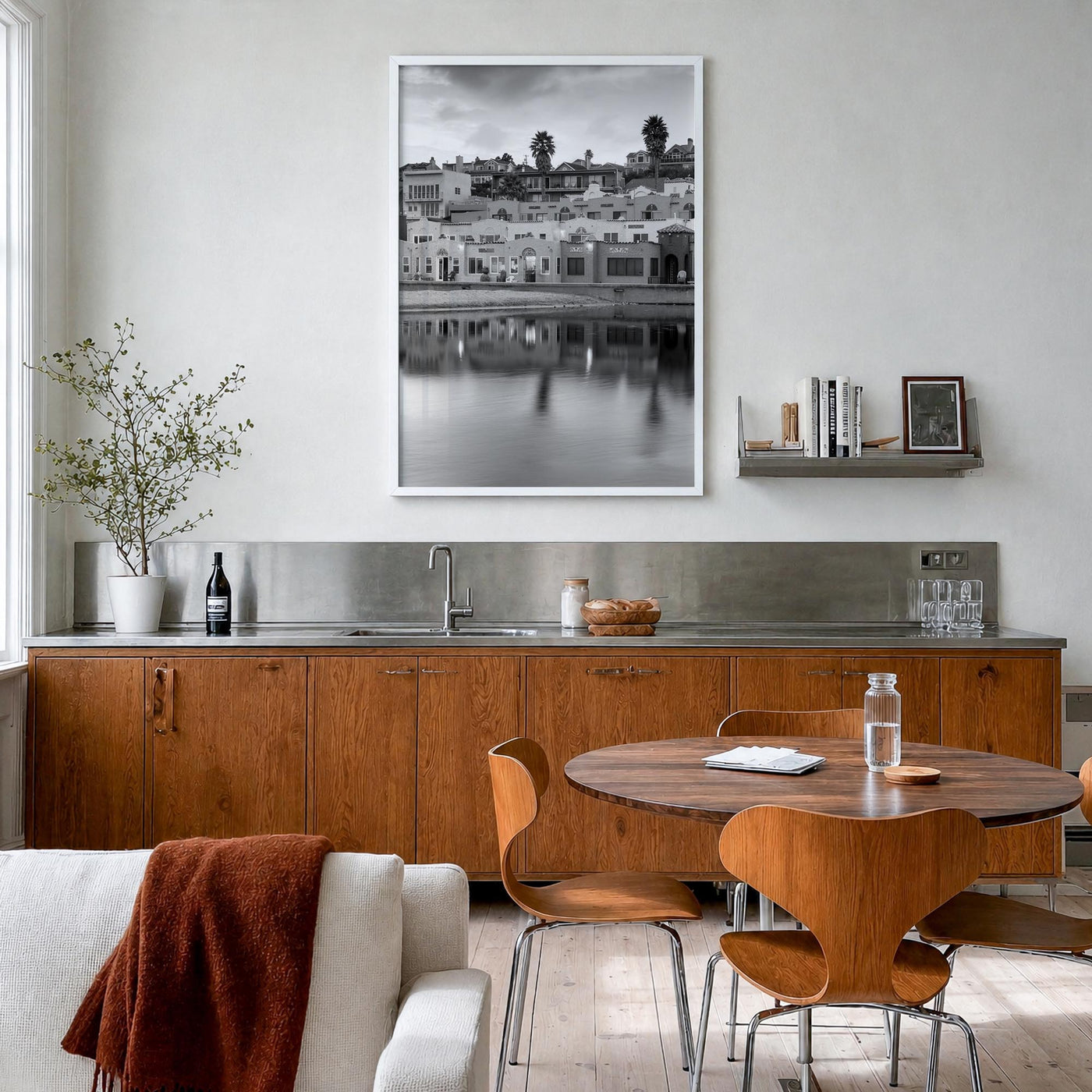 Capitola black & white photo poster of California, USA – vertical wall art in white wood frame, hanging on wall