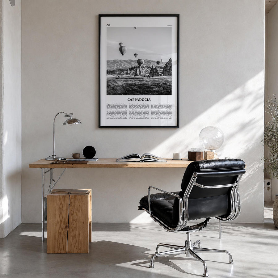 Cappadocia black & white newspaper poster of Türkiye – vertical wall art in black wood frame, hanging on wall
