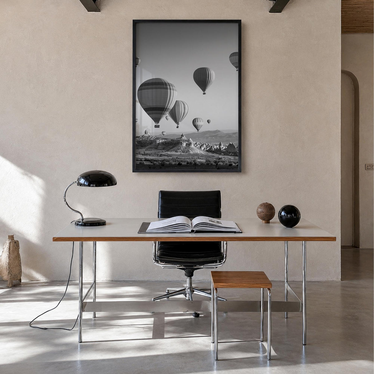 Cappadocia black & white photo poster of Türkiye – vertical wall art in black wood frame, hanging on wall