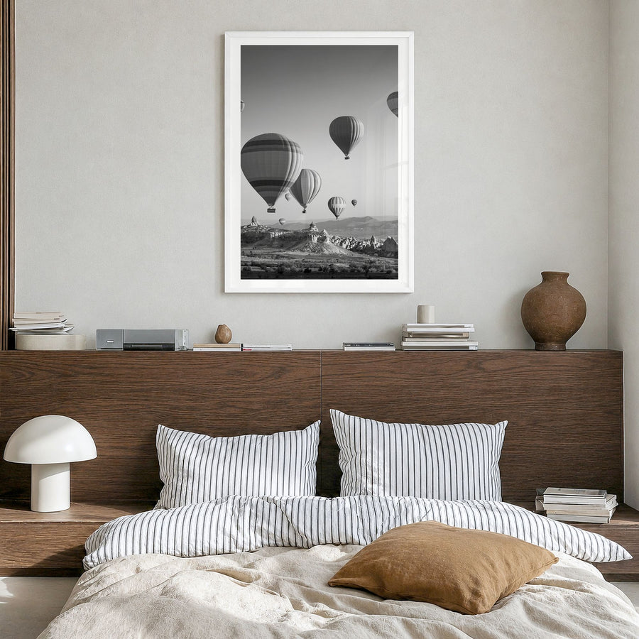 Cappadocia Photo Poster in a white wood frame, hanging in a bedroom, white border