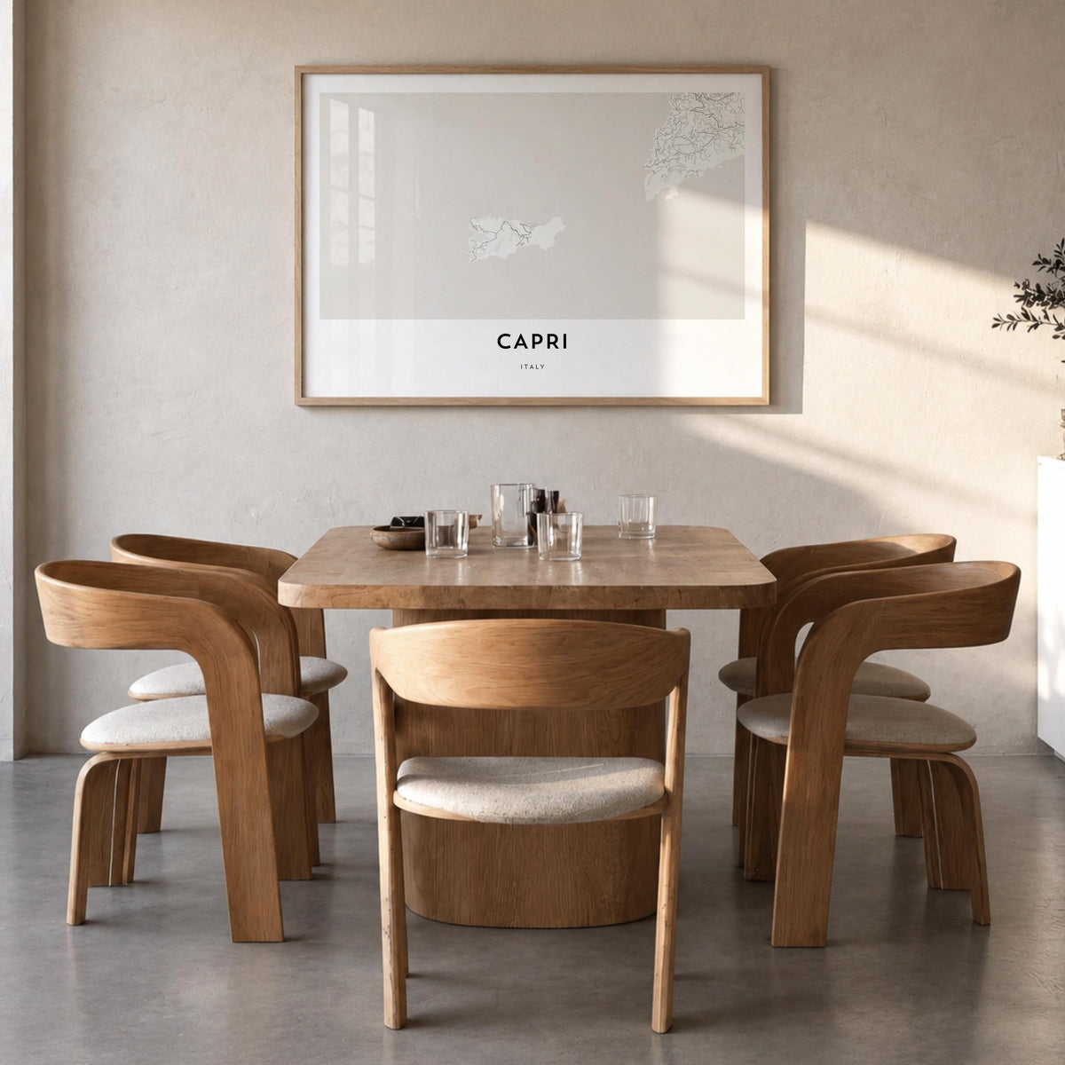 Capri black & white map poster of Italy – horizontal wall art in natural wood frame, hanging on wall