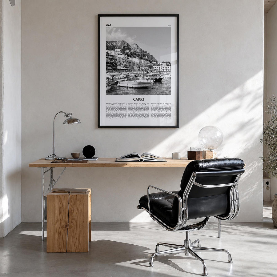 Capri black & white newspaper poster of Italy – vertical wall art in black wood frame, hanging on wall