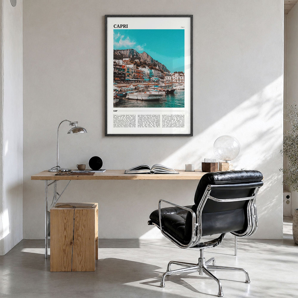 Capri Travel Poster in a black wood frame, hanging in a bright home office