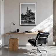 Captiva black & white photo poster of Florida, USA – vertical wall art in black wood frame with white border, hanging on wall