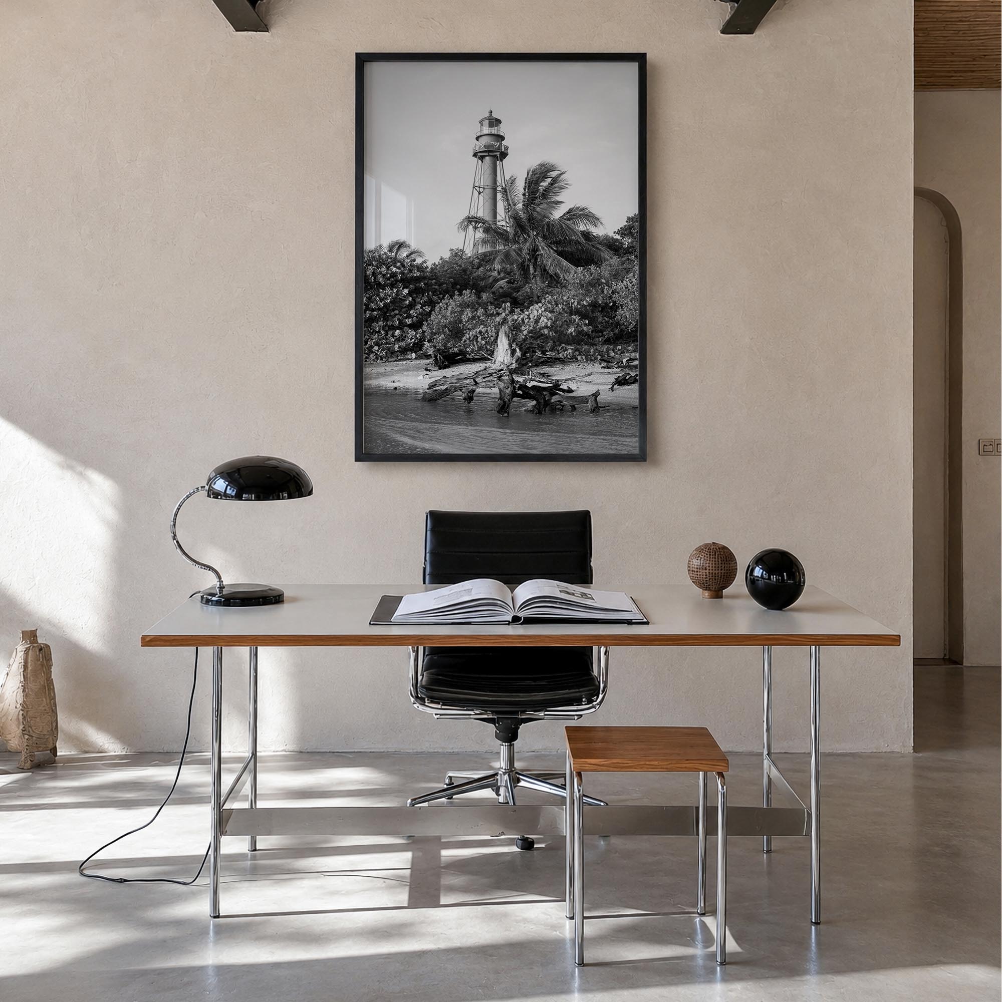Captiva black & white photo poster of Florida, USA – vertical wall art in black wood frame, hanging on wall