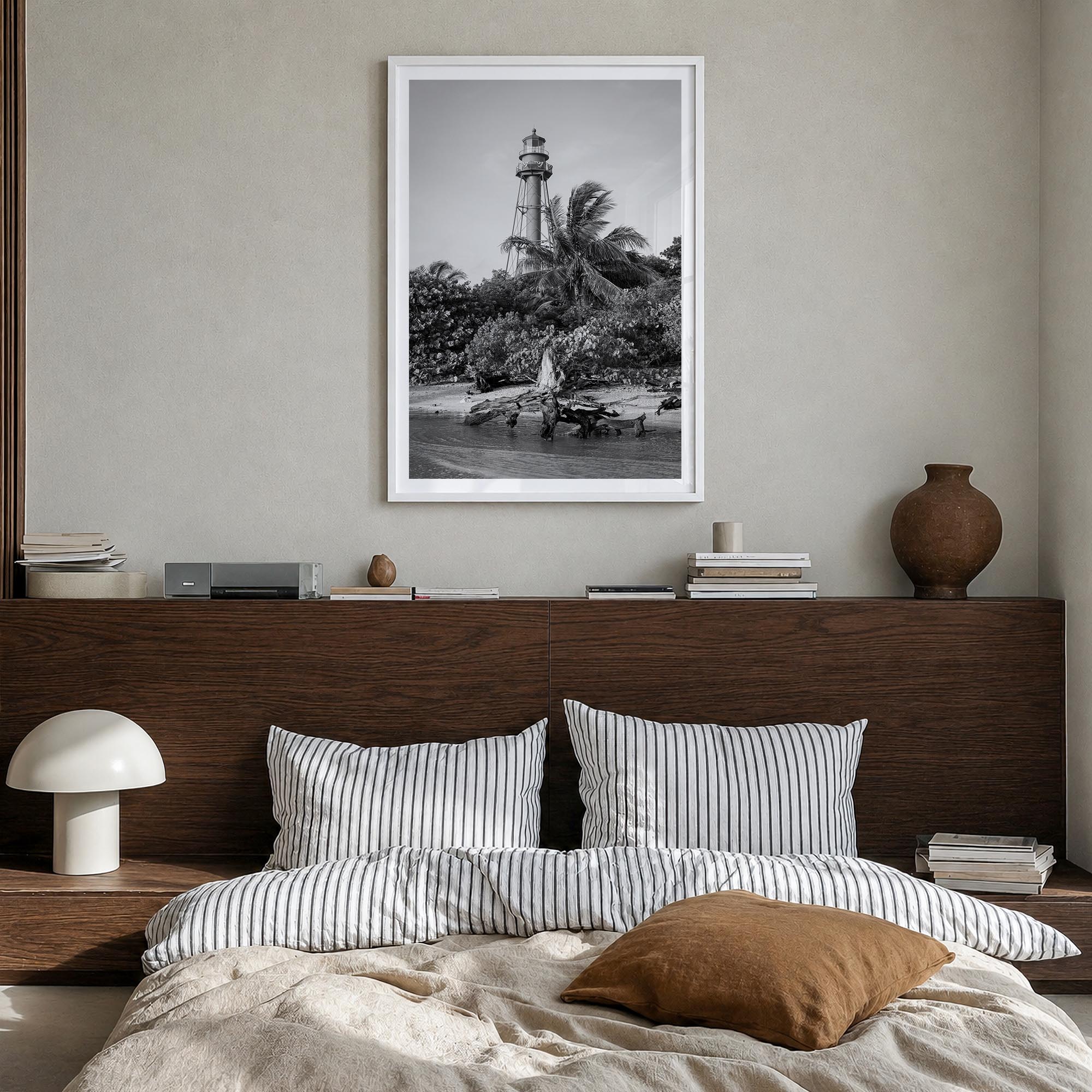 Captiva black & white photo poster of Florida, USA – vertical wall art in white wood frame with white border, hanging on wall