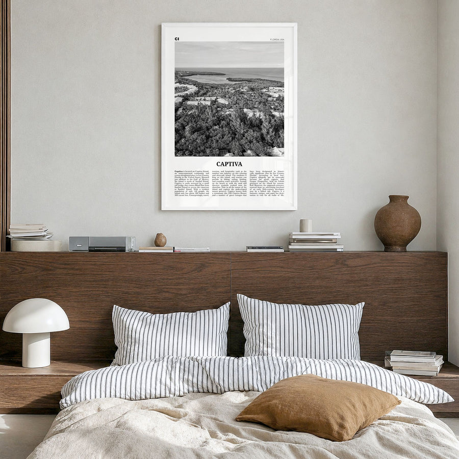 Captiva Newspaper No 2 Poster in a white wood frame, hanging in a bedroom