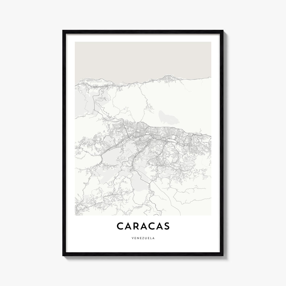 Caracas black & white map poster of Venezuela – vertical wall art, unframed print shown in interior mockup