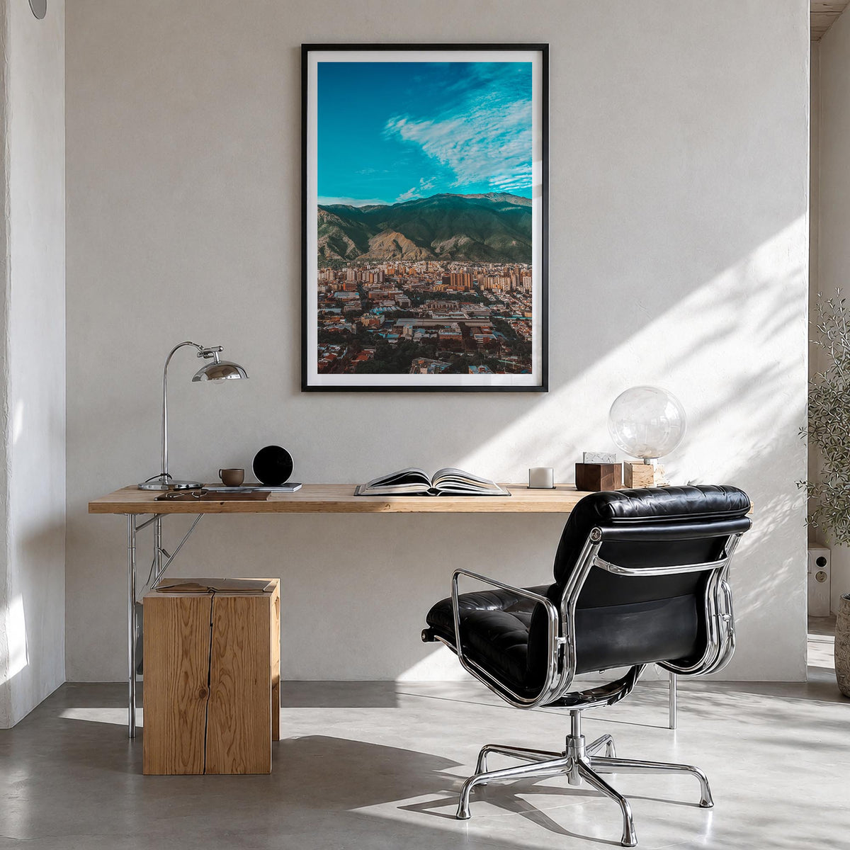 Caracas colorful photo poster of Venezuela – vertical wall art in black wood frame with white border, hanging on wall