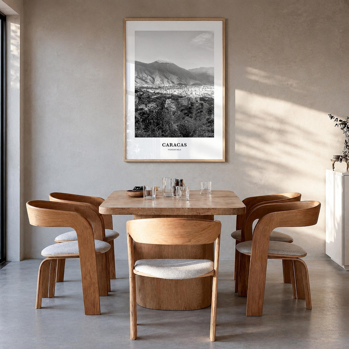 Caracas no. 1 black & white classic poster of Venezuela – vertical wall art in natural wood frame, hanging on wall