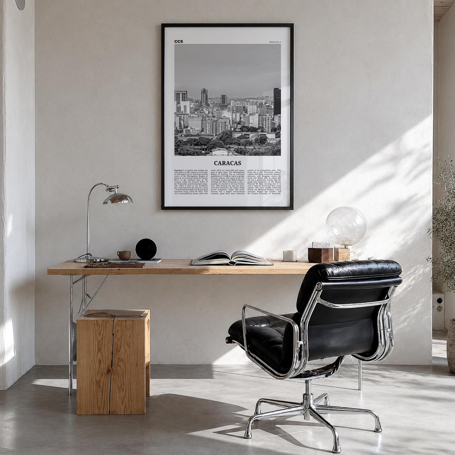 Caracas no. 1 black & white newspaper poster of Venezuela – vertical wall art in black wood frame, hanging on wall