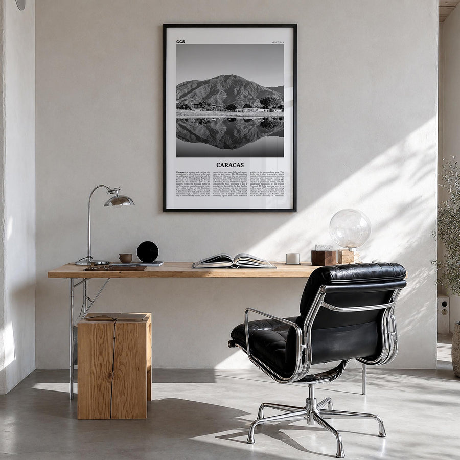 Caracas no. 3 black & white newspaper poster of Venezuela – vertical wall art in black wood frame, hanging on wall