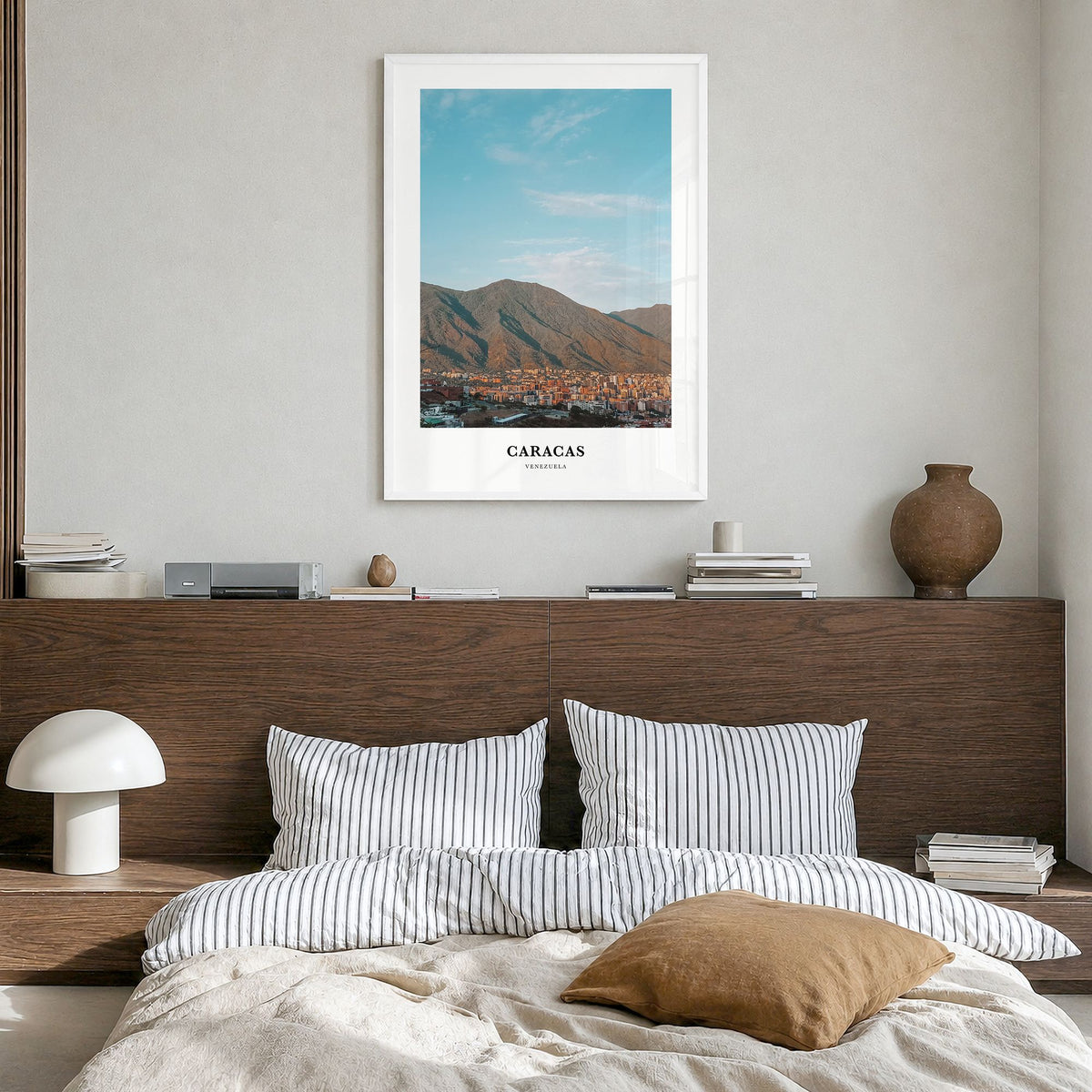 Caracas Classic No 1 Poster in a white wood frame, hanging in a bedroom