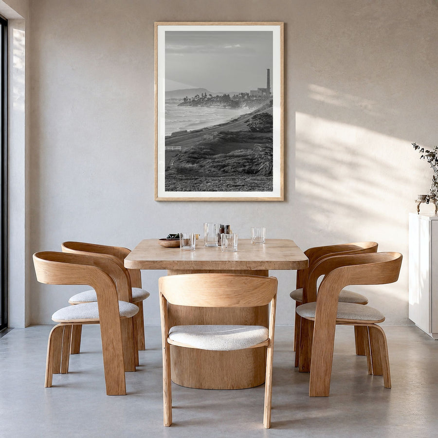 Carlsbad Photo No 1 Poster in a natural wood frame, hanging in a dining room, white border