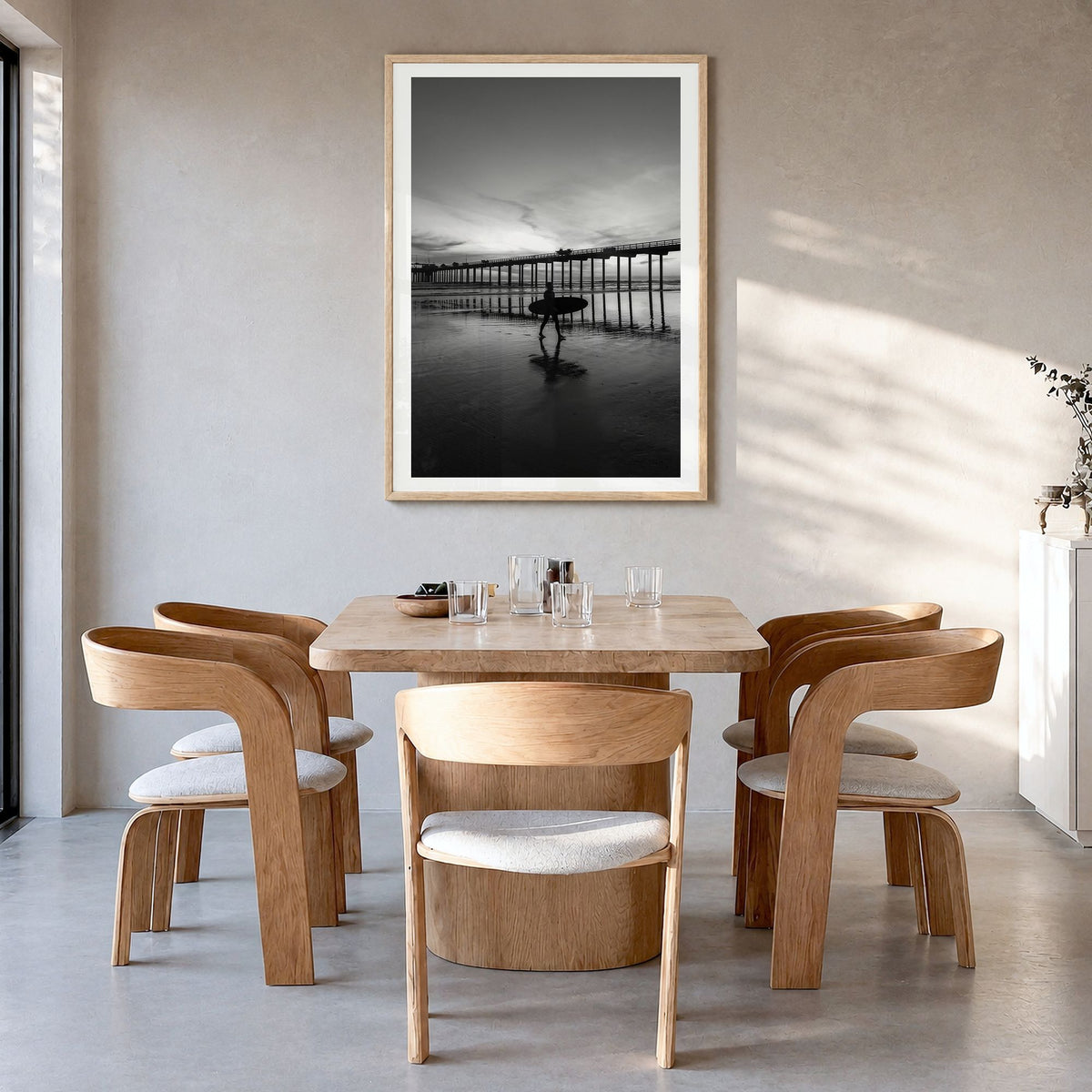 Carlsbad Photo No 2 Poster in a natural wood frame, hanging in a dining room, white border