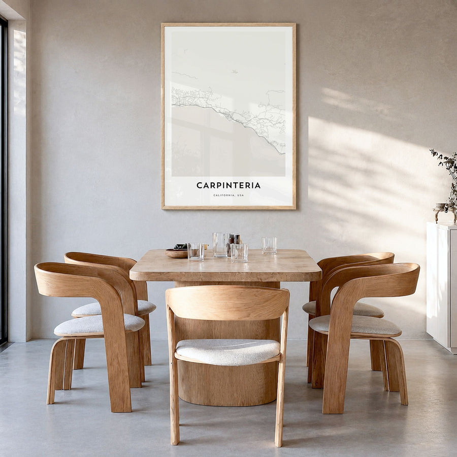 Carpinteria Map Poster in a natural wood frame, hanging in a dining room