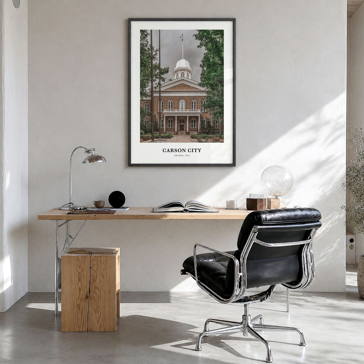 Carson City Classic Poster in a black wood frame, hanging in a bright home office