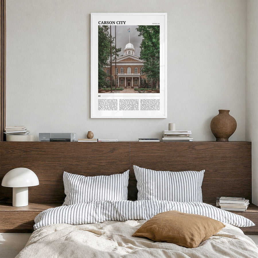 Carson City Travel Poster in a white wood frame, hanging in a bedroom