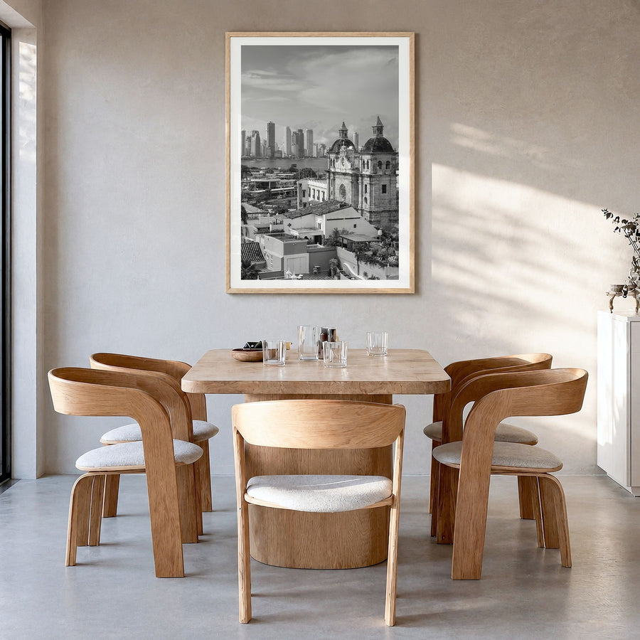 Cartagena de Indias Photo Poster in a natural wood frame, hanging in a dining room, white border