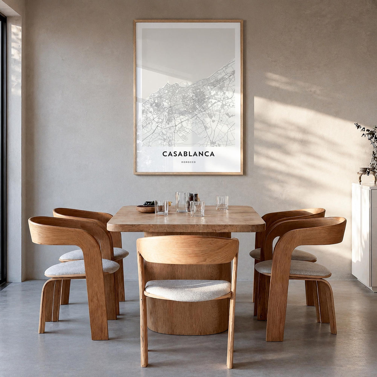 Casablanca black & white map poster of Morocco – vertical wall art in natural wood frame, hanging on wall