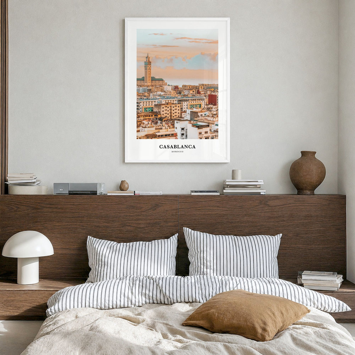 Casablanca Classic Poster in a white wood frame, hanging in a bedroom