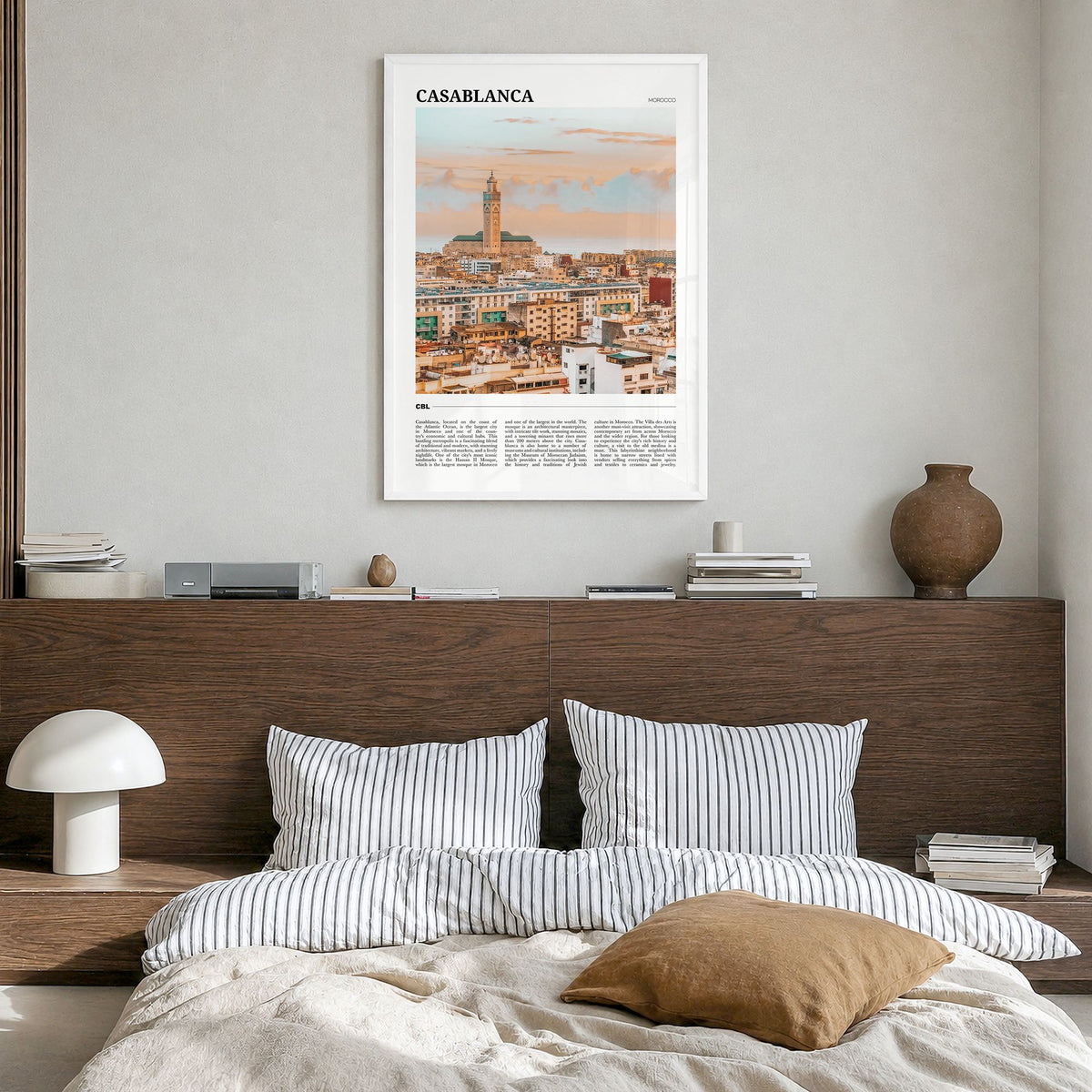 Casablanca Travel Poster in a white wood frame, hanging in a bedroom